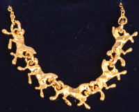 Gold running horse pendant